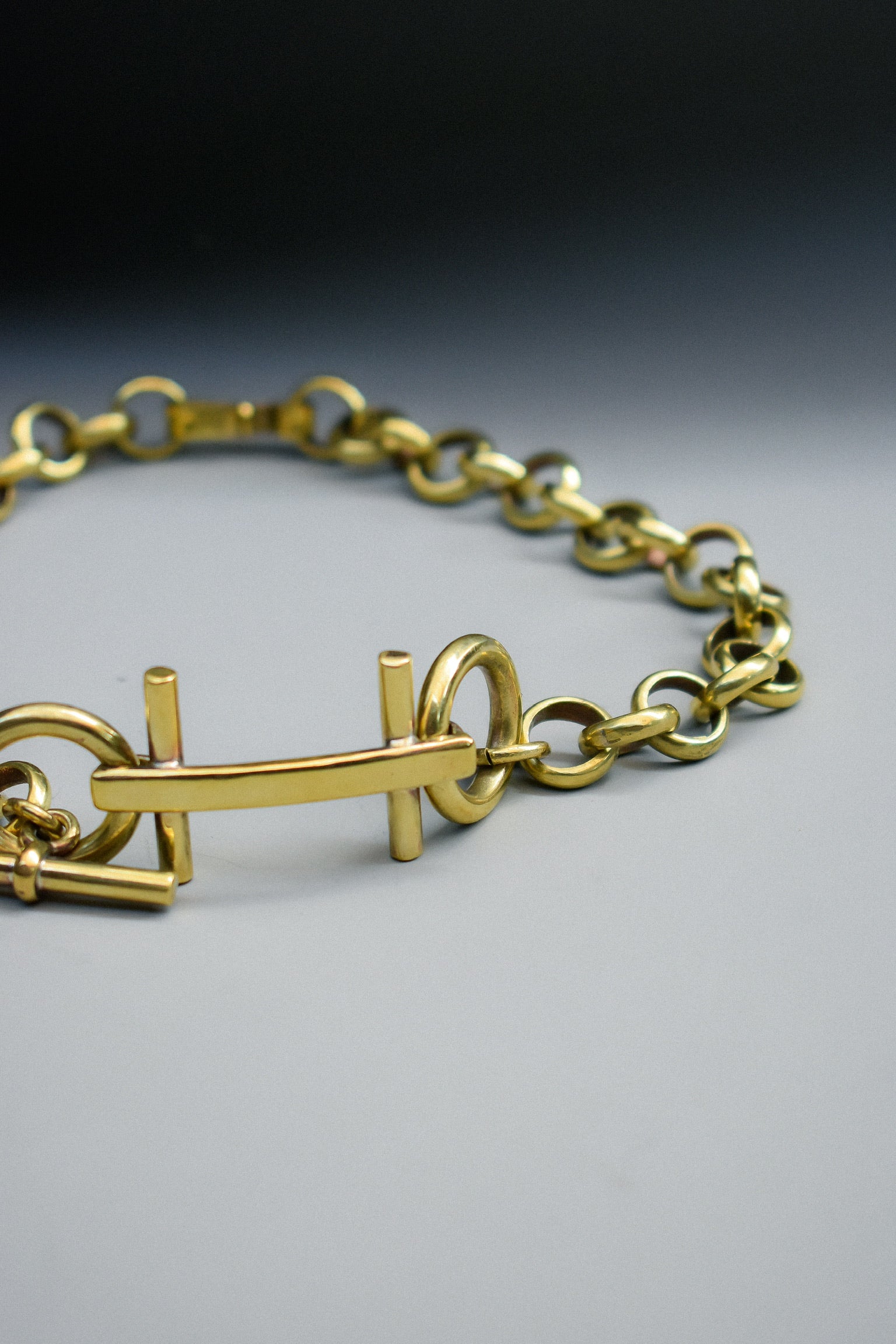 Collar H Bronce 