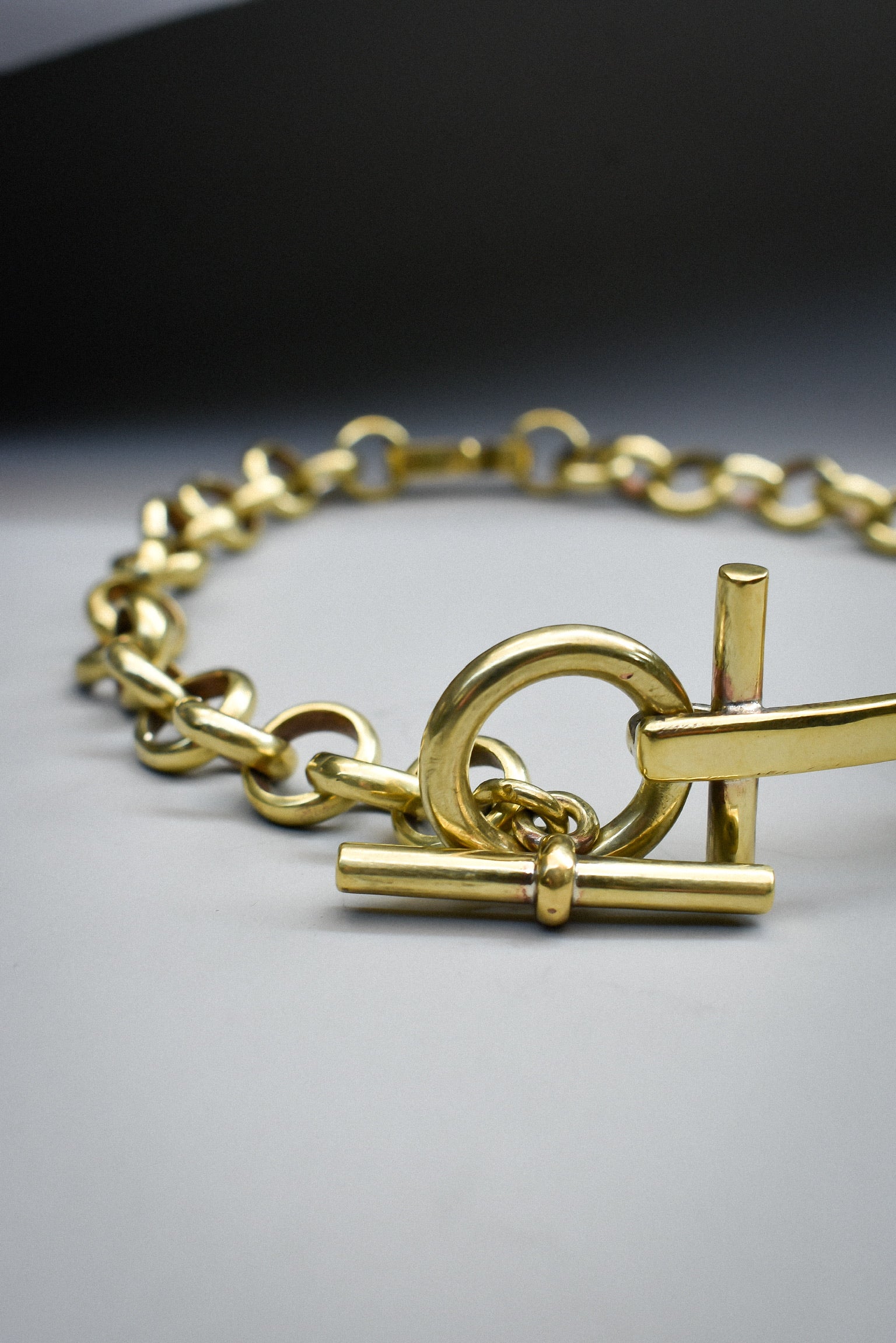 Collar H Bronce 