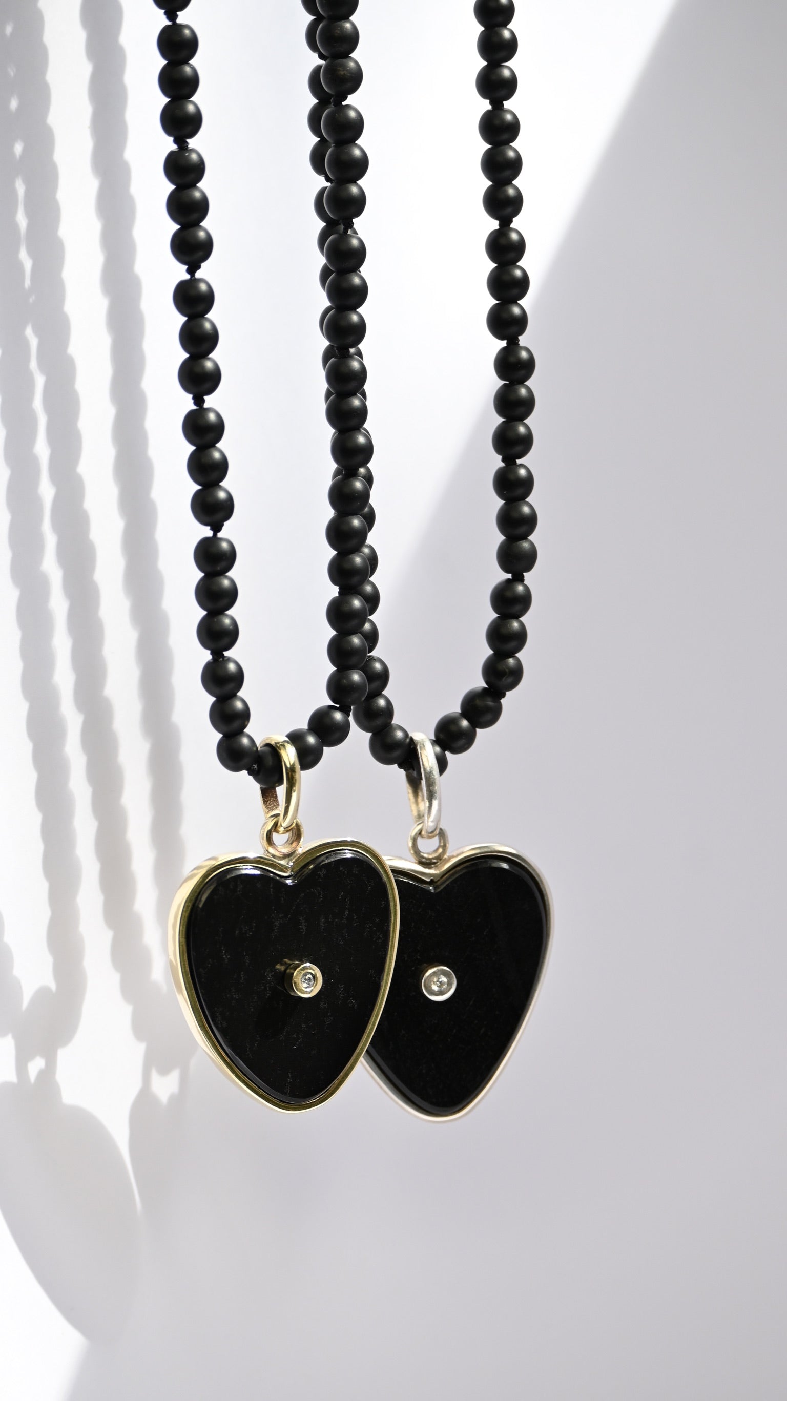Corazón Ónix Circón Bronce